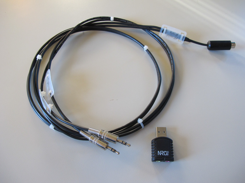 Picture of the finished cable next to the sound card dongle.
